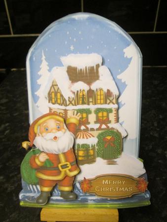 Globe Christmas Santa by Anne-marie Wheeler