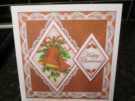 Red Bells Happy Christmas 7in Double Diamond Topper by Anne-marie Wheeler