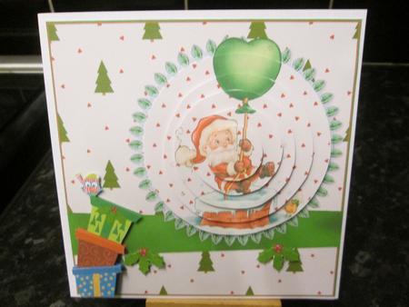 Santa Floats Down the Chimney Card Front and Pyramid by Anne-marie Wheeler