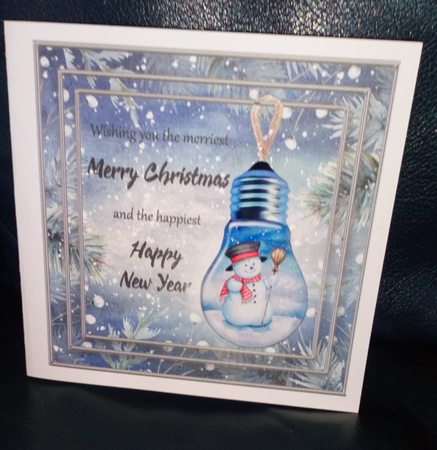 Snowman Lightbulb Snow-Globe Card Front by Anne McIntyre