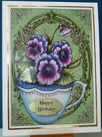 Cup of Pansies Birthday Card by Anne Ray