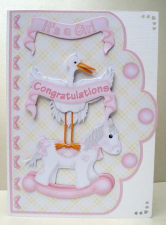 Rock-a-bye Baby - Its a Girl Scallop Edge Card Front by Audrey Brown clifford