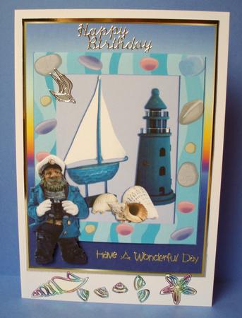 Nautical Lighthouse and Boat with Shells by Audrey Brown clifford
