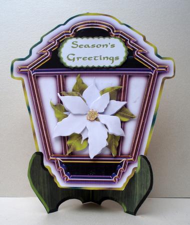 White Poinsettia Lantern Shaped Plate Card and Stand by Audrey Brown clifford