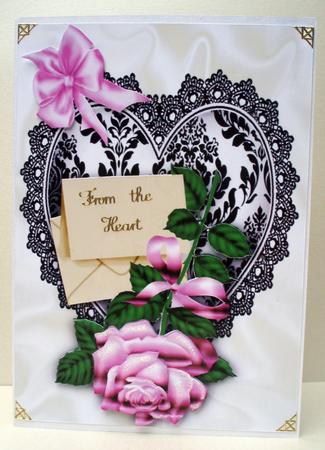 Beautiful Pink Rose on Black Lace Heart with Bow by Audrey Brown clifford