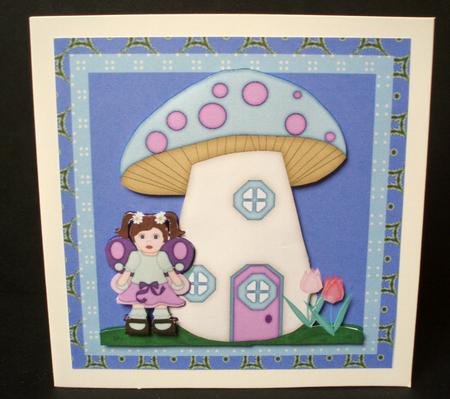 Fairy with Toadstool House by Audrey Brown clifford
