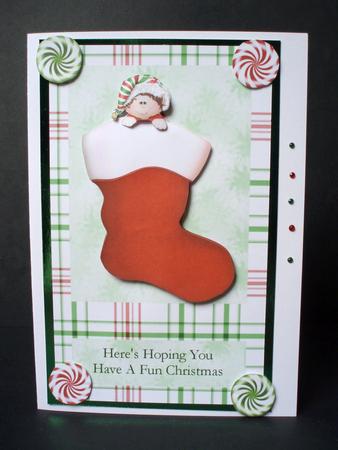 Peek-a-boo Elf in Stocking by Audrey Brown clifford