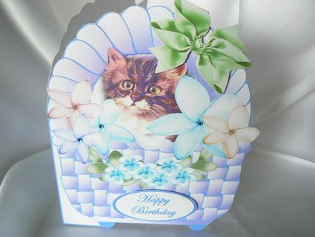 Kitten in a Blue Basket by Audrey Wilson