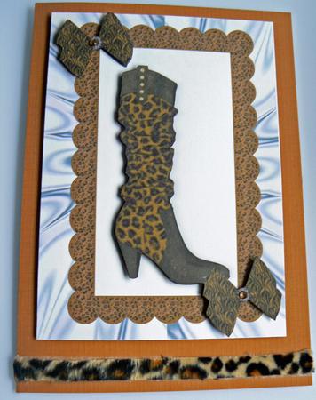 Ladies Leopard Print Boots with Brown Bows A4 by Audrey Wilson