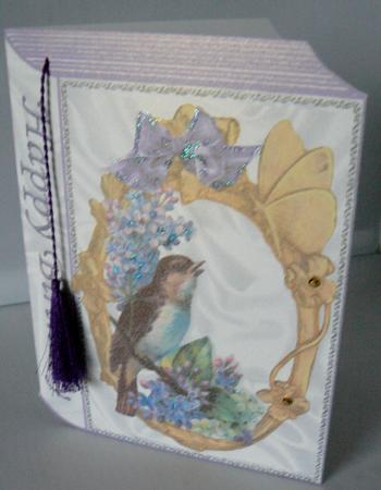 Pretty Bird with Flowers in Gold Frame Folded Book by Audrey Wilson