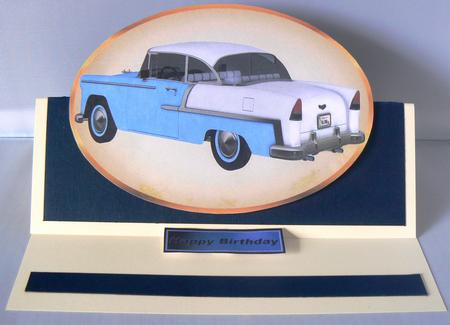 Two Chevy Bel Air Cars in Gold Oval Frame Toppers by Audrey Wilson
