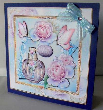 Perfume Bottle with Roses Card Front by Audrey Wilson