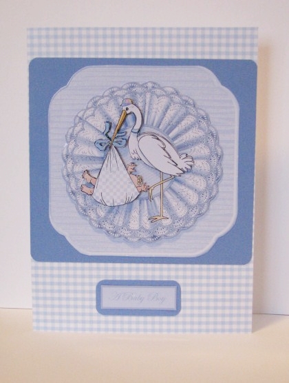 Baby Boy with Stork Card Front by Barbara Hiebert