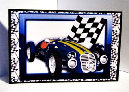 Blue Sports Racing Car in Glass Frame with Flag by Barbara Hiebert