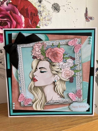 Beautiful Woman Wearing A Floral Head Piece 7x7 by BECCY WILTON