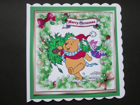 Pooh bear and piglet carrying a christmas tree in holly bow frame 8x8 by BELINDA ABRAHAM