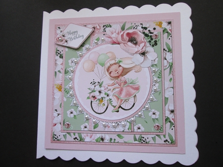 Spring Cuties 7 Floral Girl on Bicycle 8x8 Card Front with Sentiments, Pink/Green by BELINDA ABRAHAM