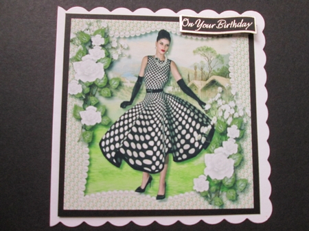 Lovely Lady in a Polka Dot Dress with White Roses  by BELINDA ABRAHAM