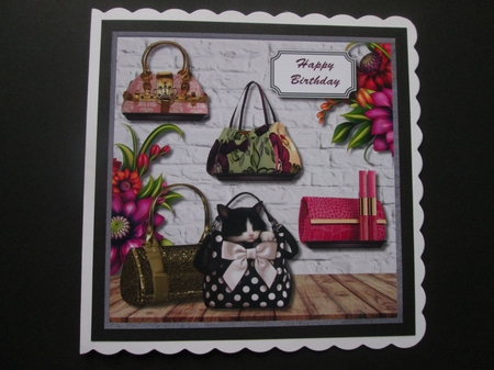Handbags and flowers by BELINDA ABRAHAM