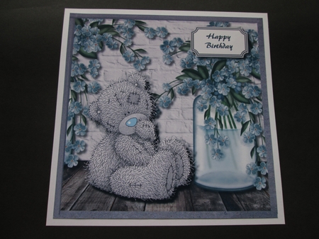 Blue flowers with tatty teddy by BELINDA ABRAHAM