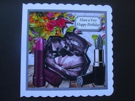 Perfume, lipsticks and flowers by BELINDA ABRAHAM