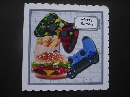 Boys and their toys games controllers by BELINDA ABRAHAM