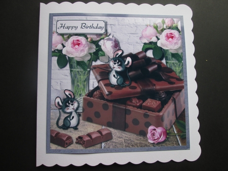 Chocolates and flowers by BELINDA ABRAHAM