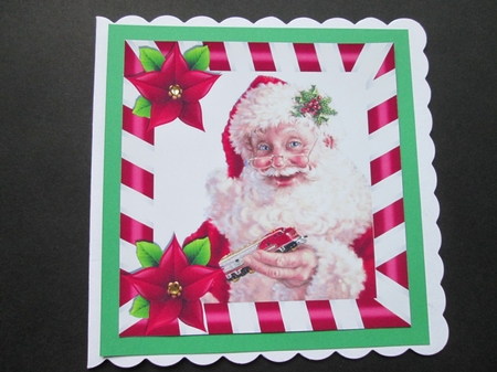 santa with toy train and poinsettias 8x8  by BELINDA ABRAHAM