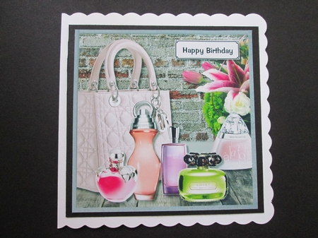 Fragrances, flowers and designer bag by BELINDA ABRAHAM