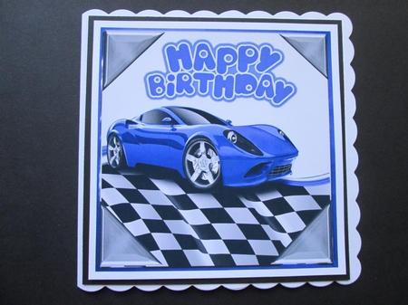 Blue sports car in chequered effect frame 8x8 by BELINDA ABRAHAM