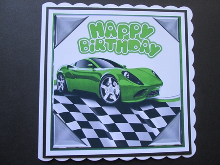 Green sports car in chequered effect frame 8x8 by BELINDA ABRAHAM