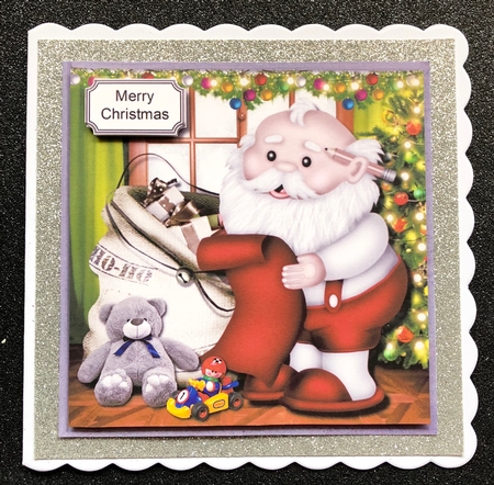 Hes making a list, hes checking it twice by Belinda Rub