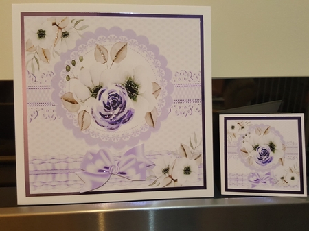 Pretty water colour flowers with border and purple  bow 8x8 by Benita Jenkinson