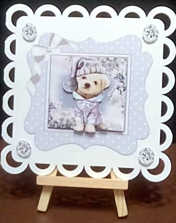 Cute pooch in silver polkadot 7x7 frame with bow by Benita Jenkinson