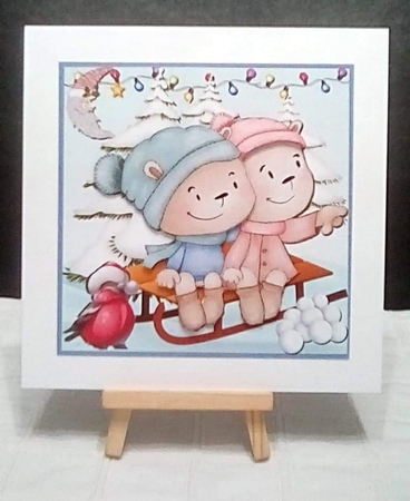 Cuddles on a sledge by Benita Jenkinson