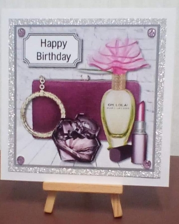 Purple perfume and bag by Benita Jenkinson