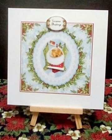 Sleepy Puppy and Kittens in a Santa Hat by Benita Jenkinson