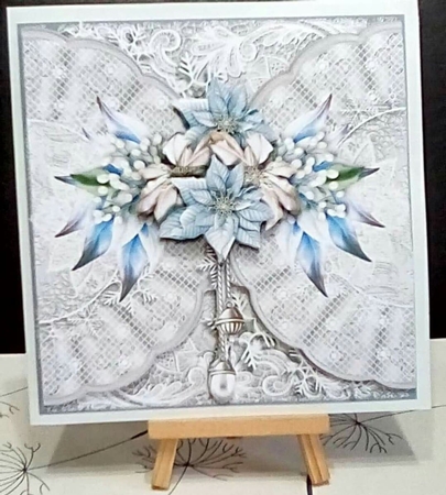 Snowflakes and lace blue poinsettia by Benita Jenkinson