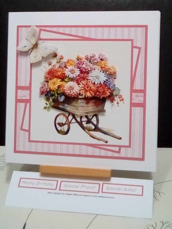 Wheel barrow of Chrysanthemums 7x7 by Benita Jenkinson