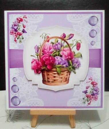 A basket of sweet peas by Benita Jenkinson