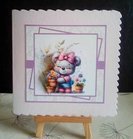 Bear tending her flower pots 7x7 by Benita Jenkinson