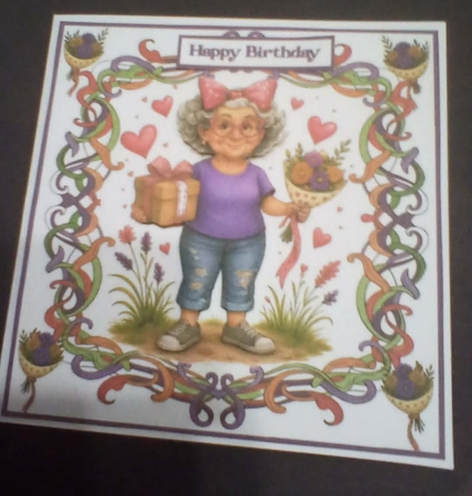 Flowers and a gift by Benita Jenkinson