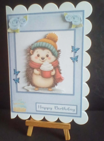 Hedgehog with cup of chocolate greeting card by Benita Jenkinson