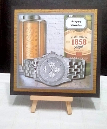 Mens watch, beer and aftershave by Benita Jenkinson