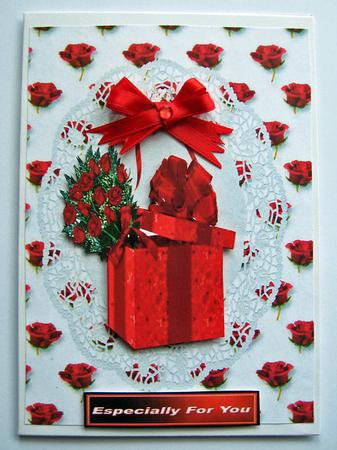 Lovely Red Roses and Present on Lace Background by Berit Zakrisson