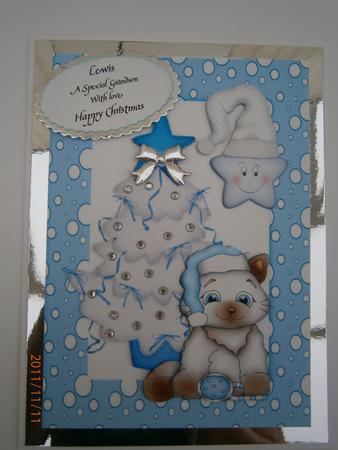 Cute Little Kitten with Christmas Tree and Cheeky Star A4 by Bernie Mclaughlin