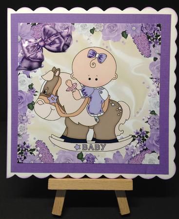 Baby Girl on a Rocking Horse with Bow 8x8 by Bettina Keis Jensen