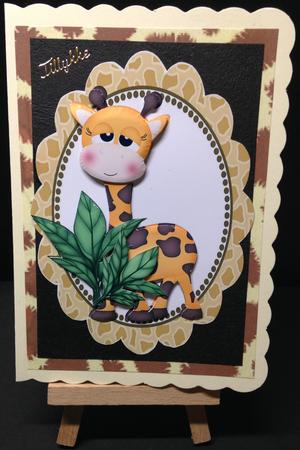 Cute Giraffe with Green Leaves in a Frame by Bettina Keis Jensen