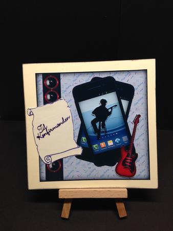 Teen Playing the Guitar in a Smartphone Sbs by Bettina Keis Jensen