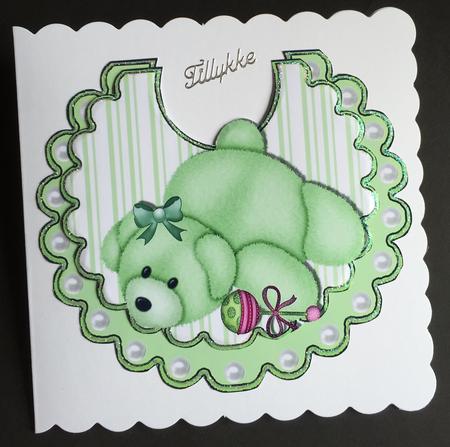 Green Bear with Toy Rattle on Striped Bib by Bettina Keis Jensen